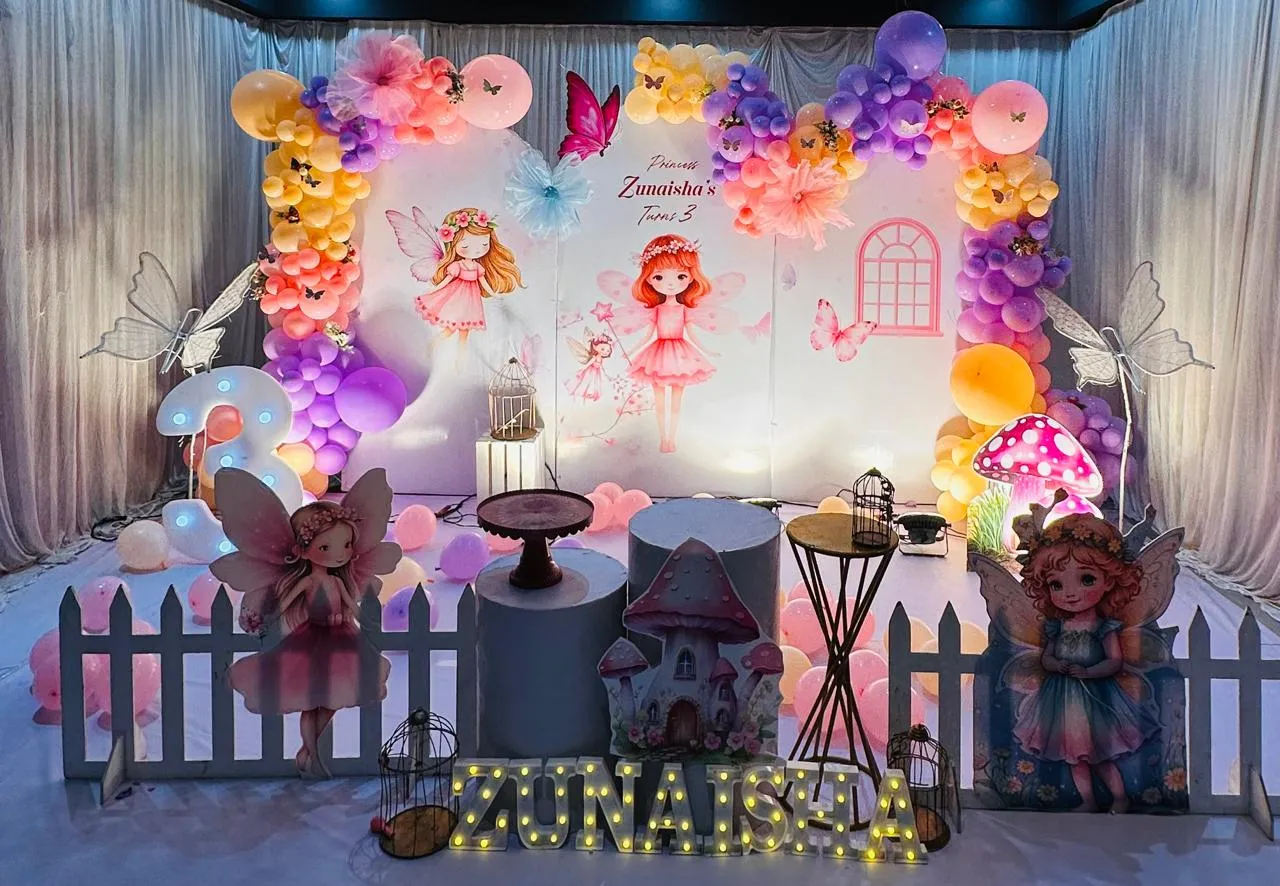 Onederful Theme with balloons, 3 round cake tables, LED name & age, wooden butterfly and entrance balloons arch.