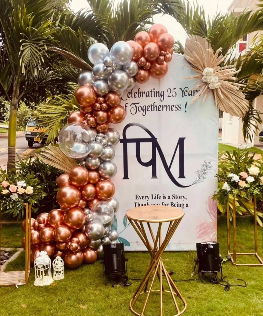 Rose gold twenty-fifth anniversary backdrop