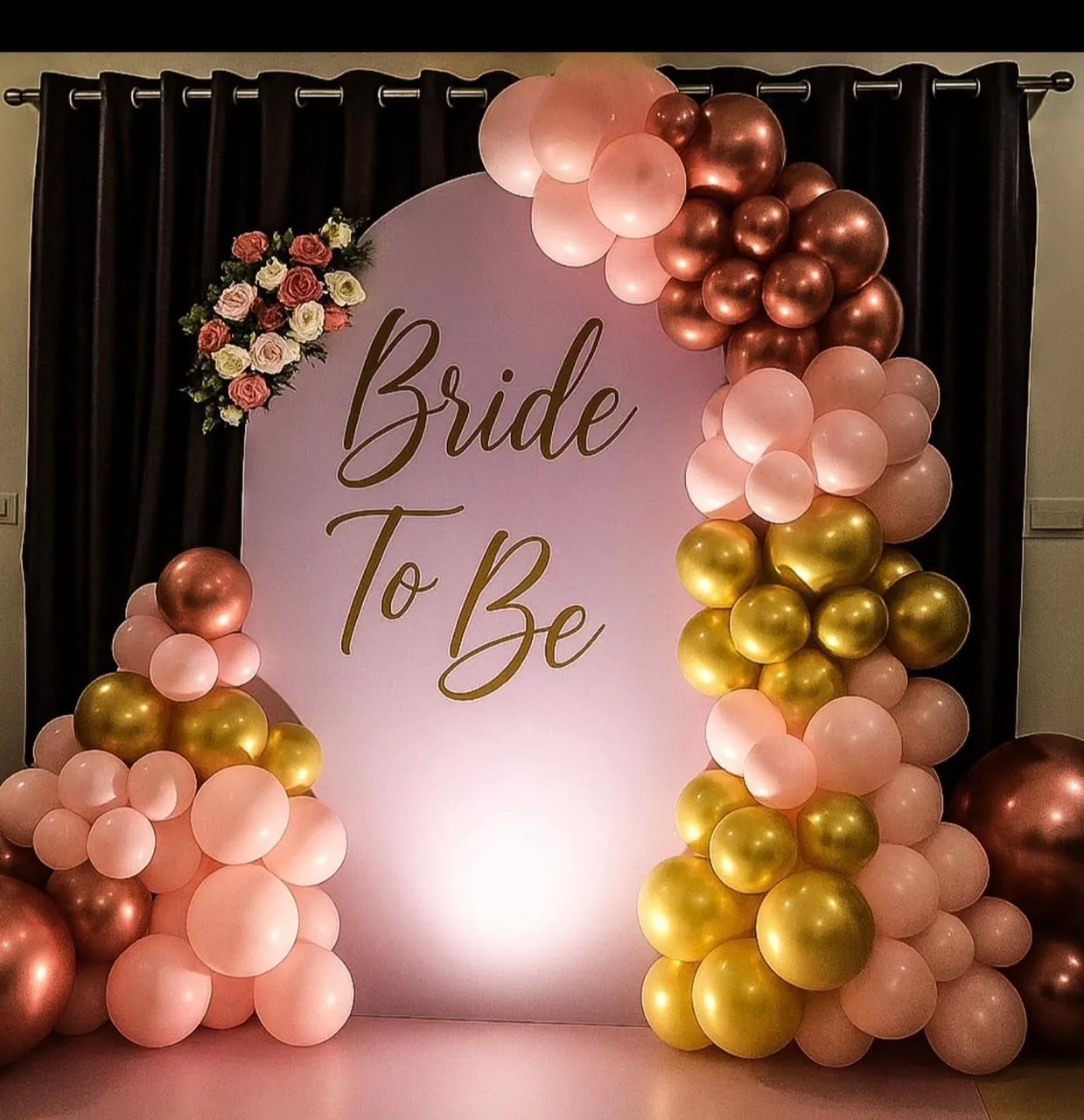 Rose gold bride to be arch with a printed panel