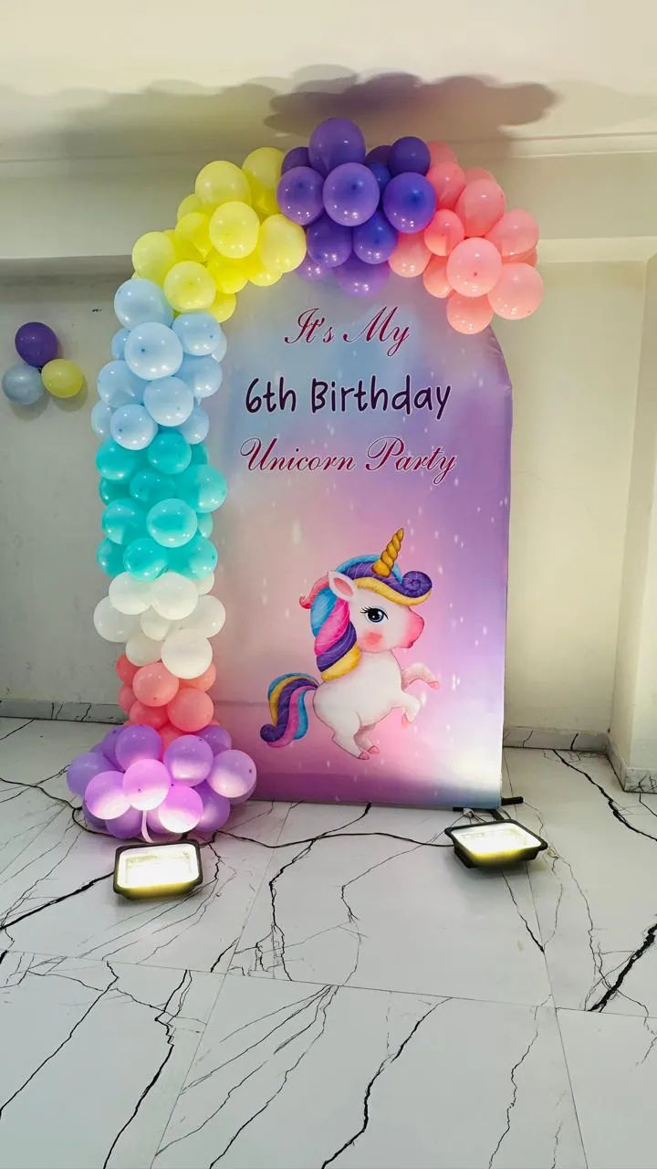 Unicorn themed sixth birthday backdrop